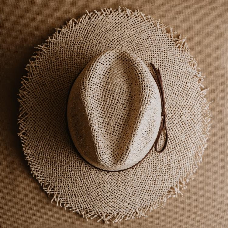 frayed straw hat